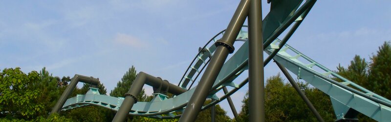 roller coaster track against sky
