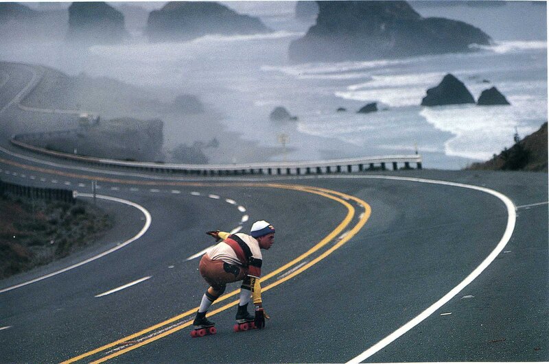 Roller skater on coastal road