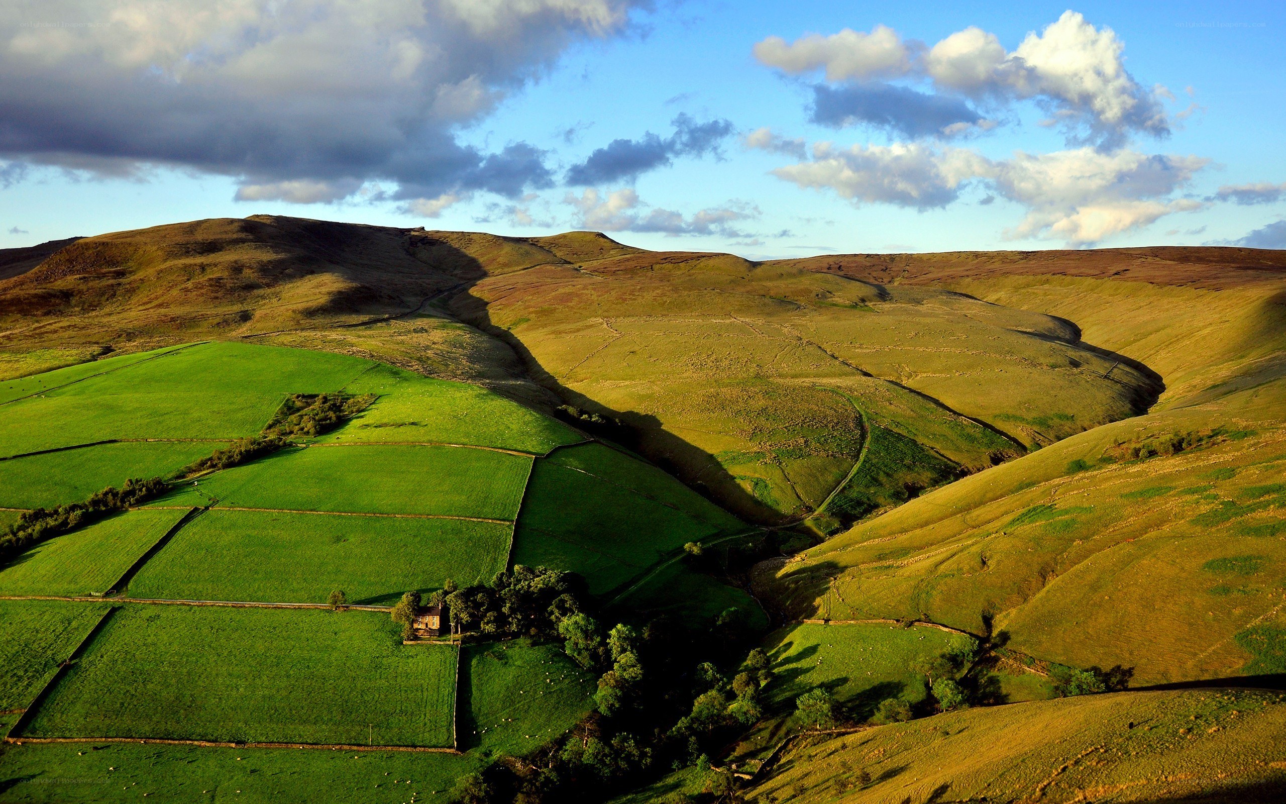 Rolling hills and green fields