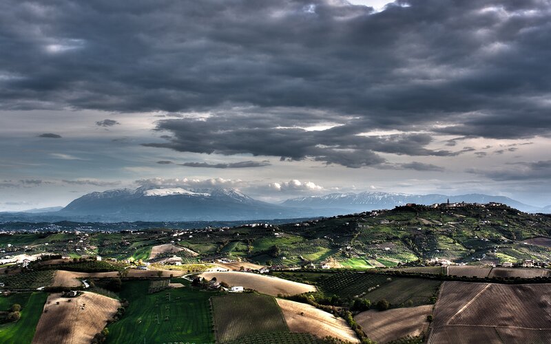 Rolling Hills and Mountains — Green, Dramatic, Afternoon
