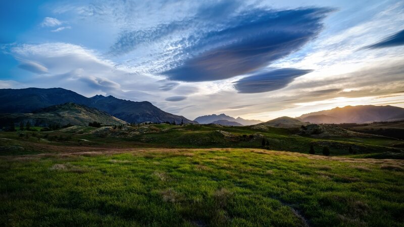 Rolling Hills and Mountains — Green, Serene, Sunset
