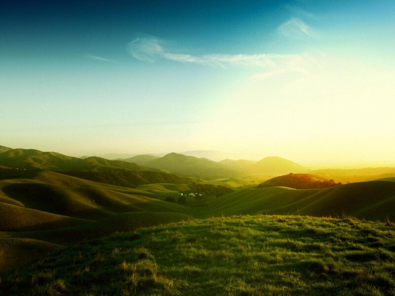 Rolling hills at sunset