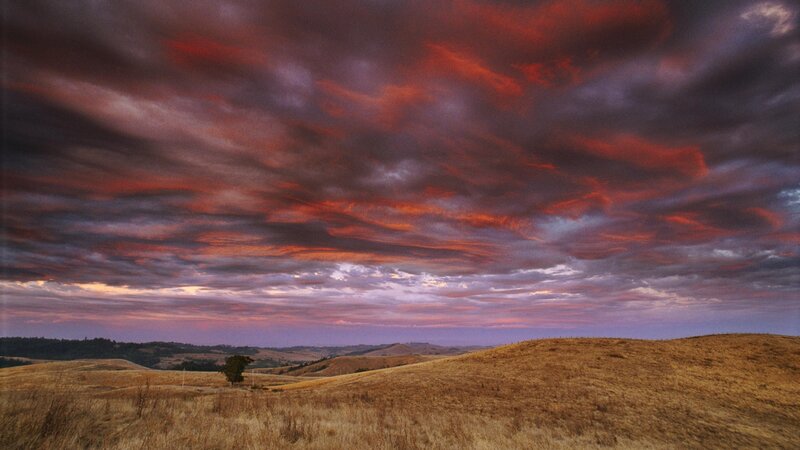 Rolling Hills at Sunset — Red, Dramatic, Photograph