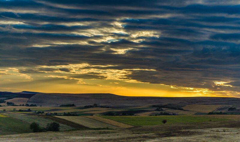 Rolling Hills at Sunset — Yellow, Dramatic, Photograph, Fields, Clouds