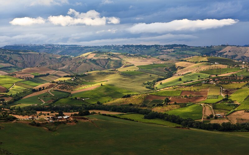 Rolling Hills Landscape — Green, Dramatic, Afternoon, Photograph, Fields, Villages