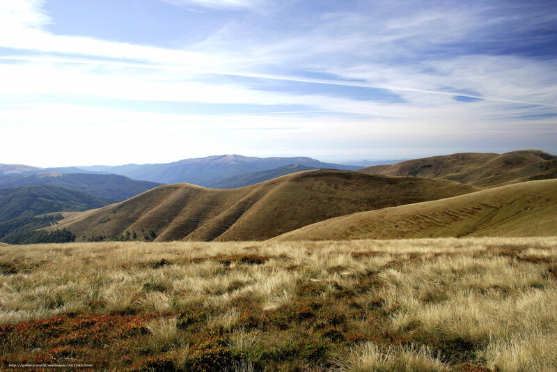 Rolling hills under blue sky