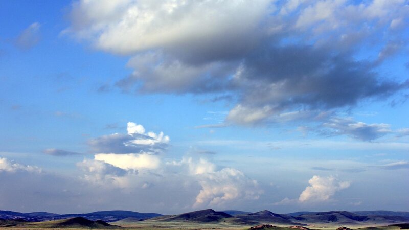 Rolling Hills under Clouds