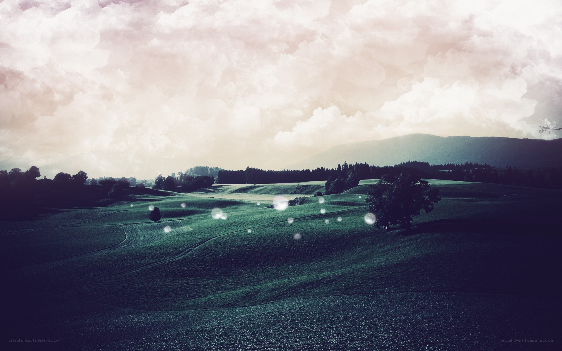 Rolling hills under cloudy sky