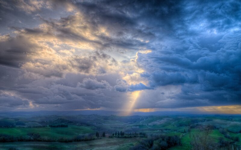 Rolling Hills under Stormy Sky — Blue, Dramatic, Sunset