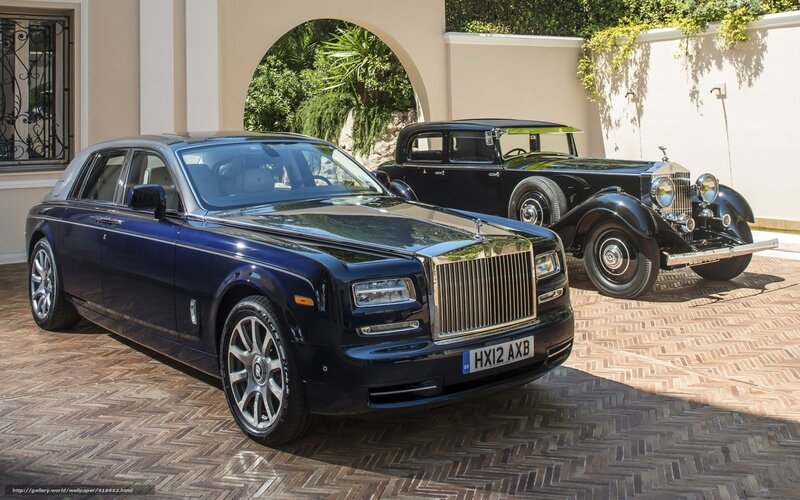 Rolls-Royce cars in driveway