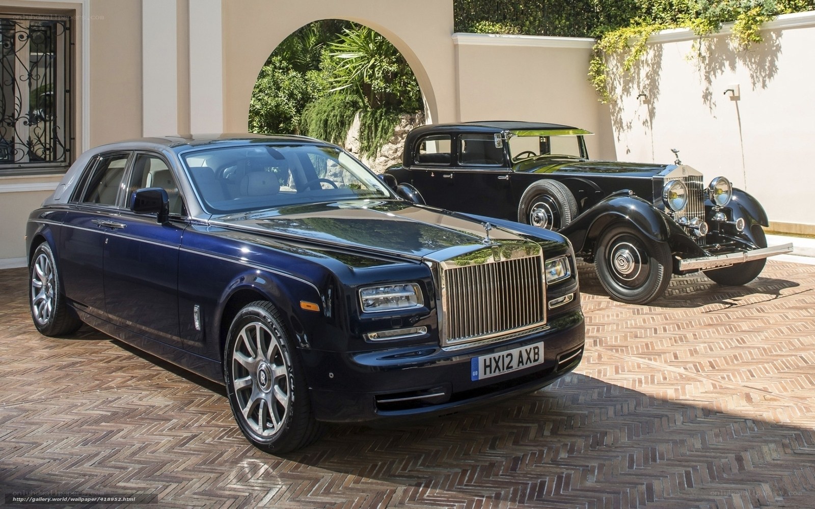 Rolls-Royce cars in driveway