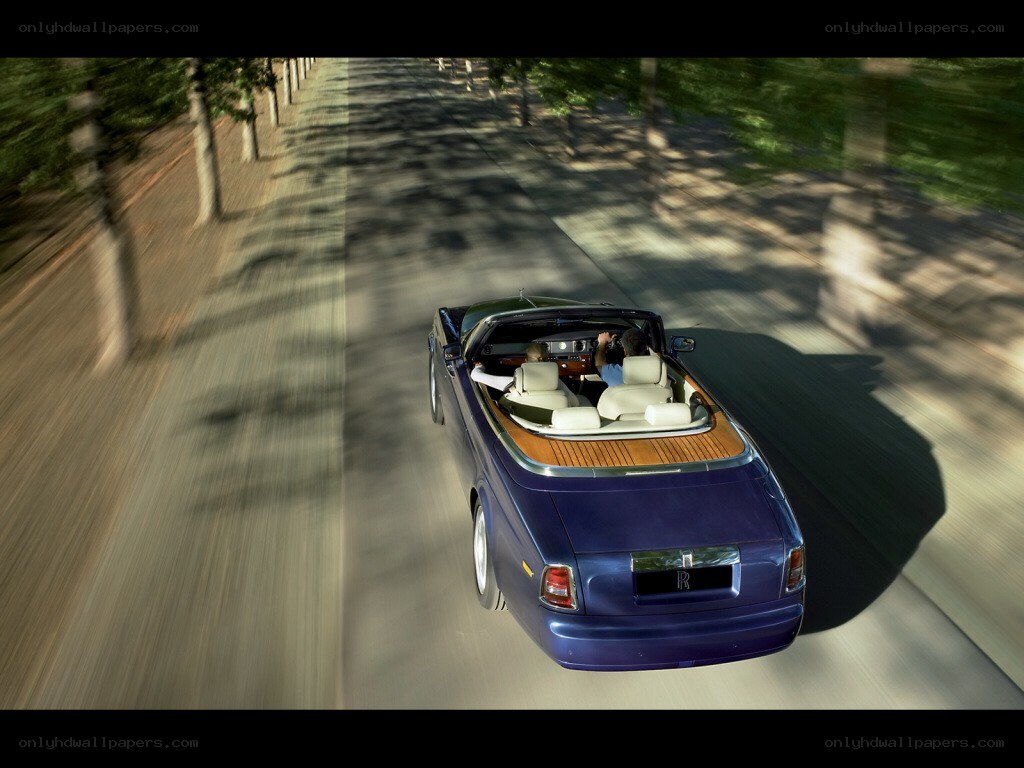 Rolls-Royce convertible driving