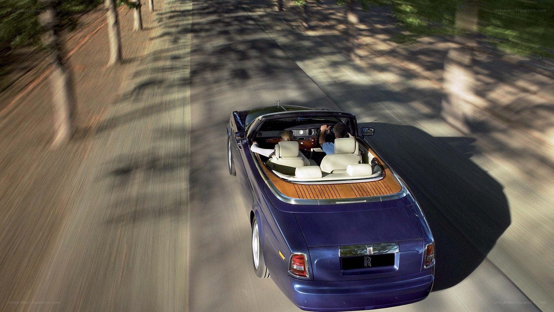 Rolls-Royce convertible in motion