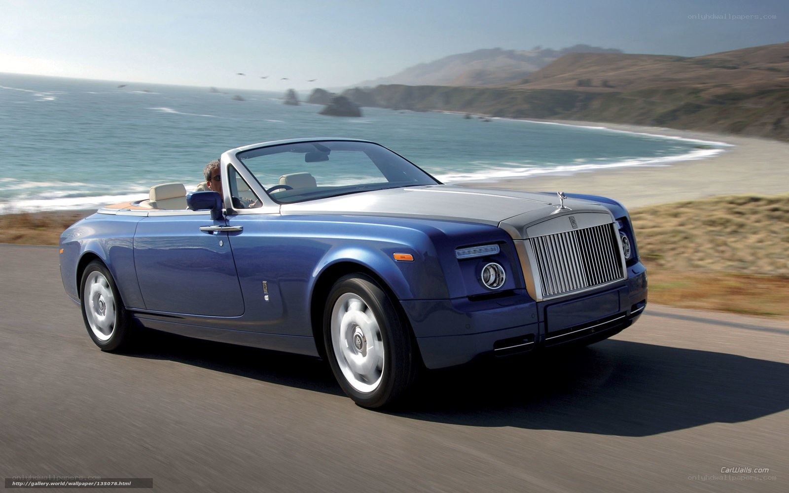 Rolls-Royce convertible on coastal road