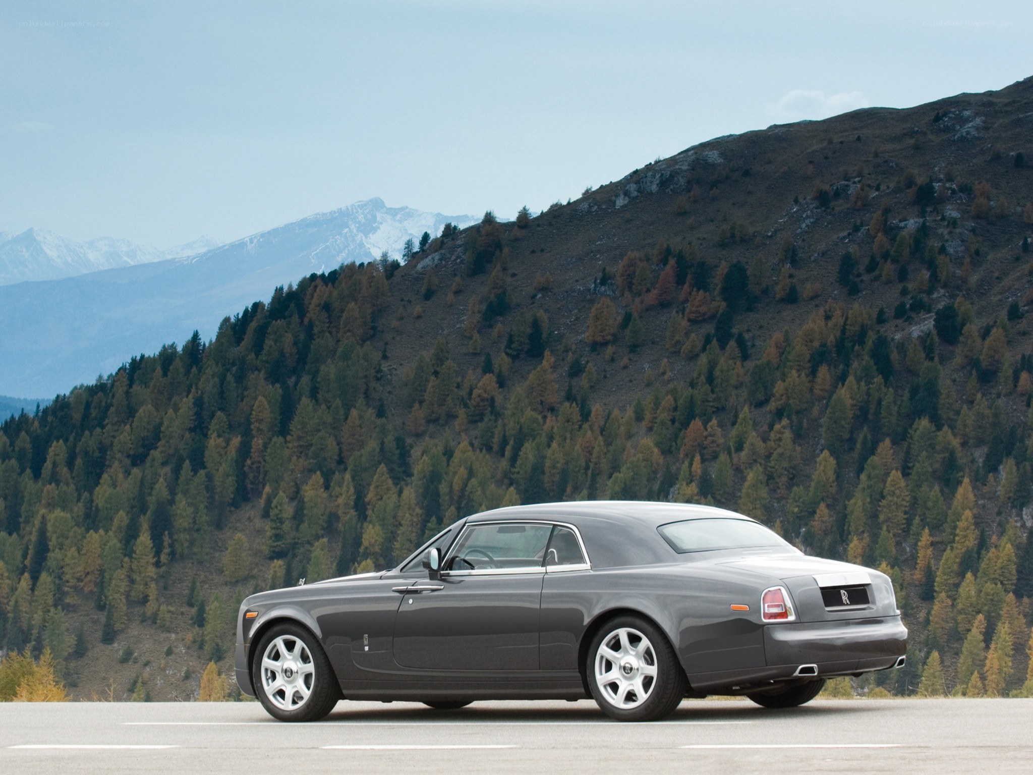 Rolls-Royce in mountain landscape
