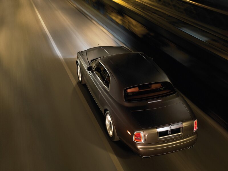 Rolls-Royce on a dark road