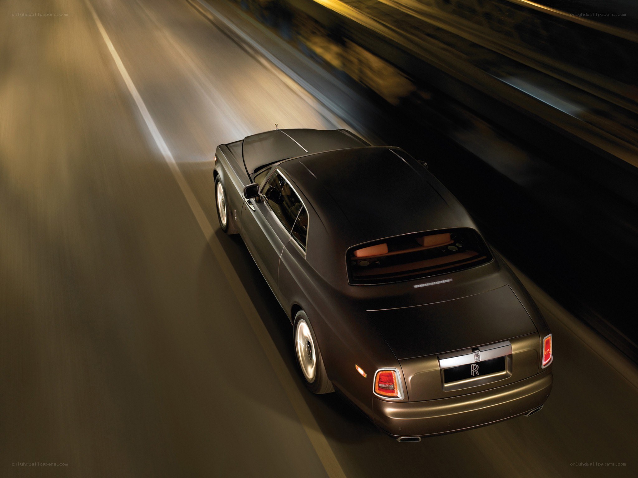 Rolls-Royce on a dark road