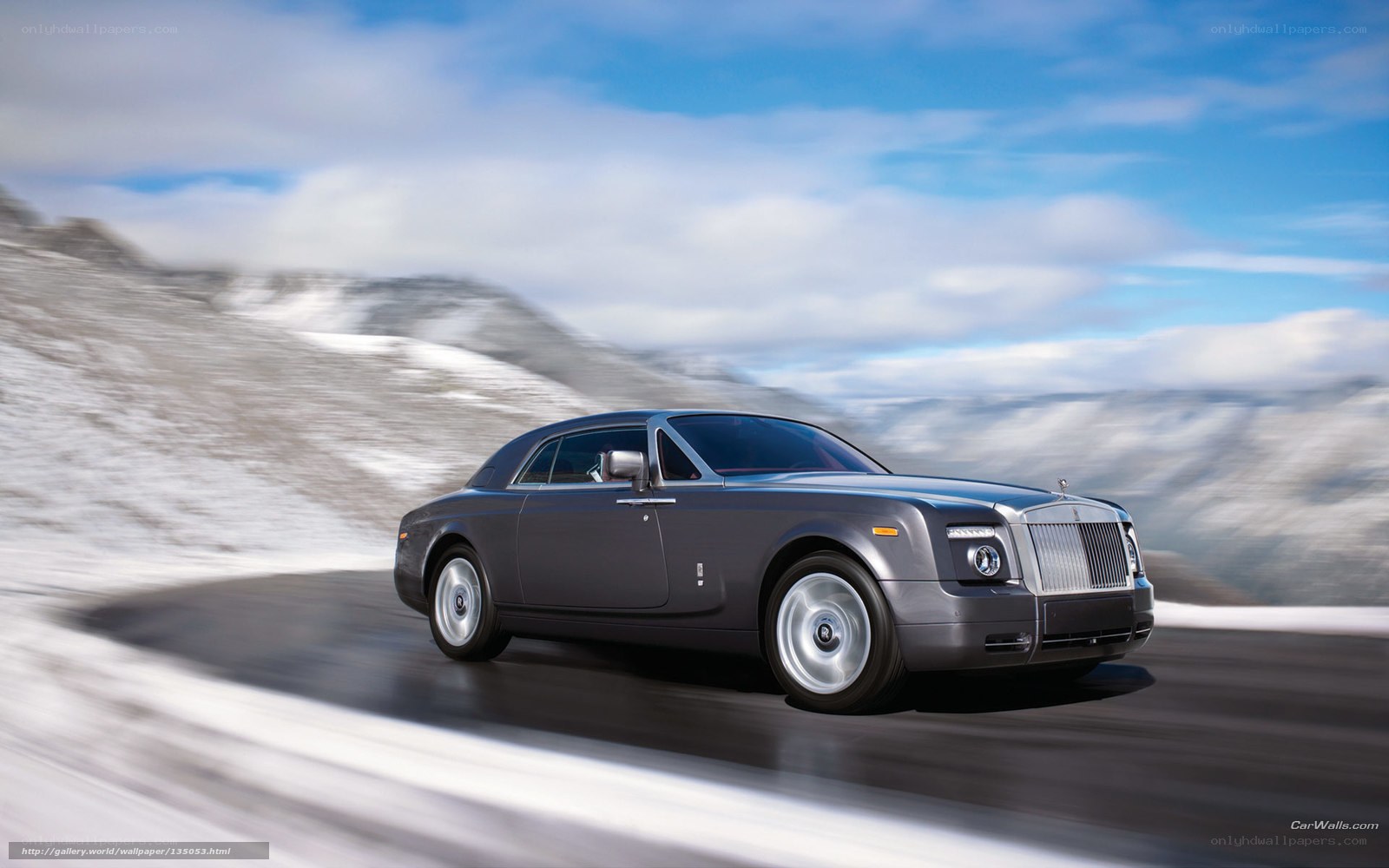 Rolls-Royce on snowy mountain road