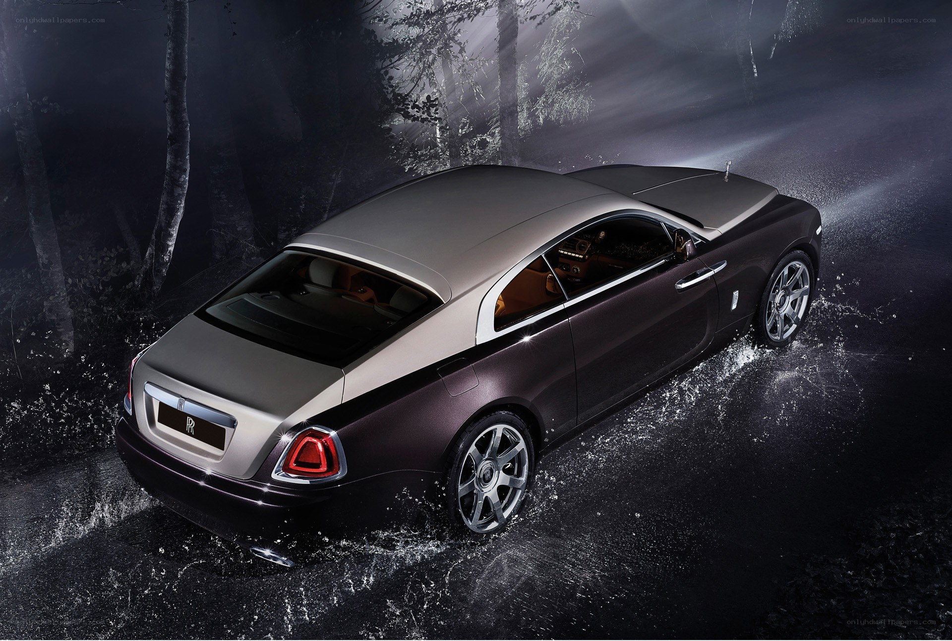 Rolls-Royce on wet road