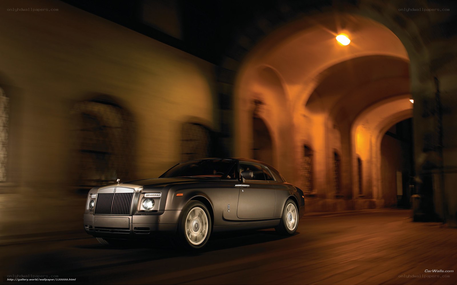 Rolls-Royce Phantom driving at night