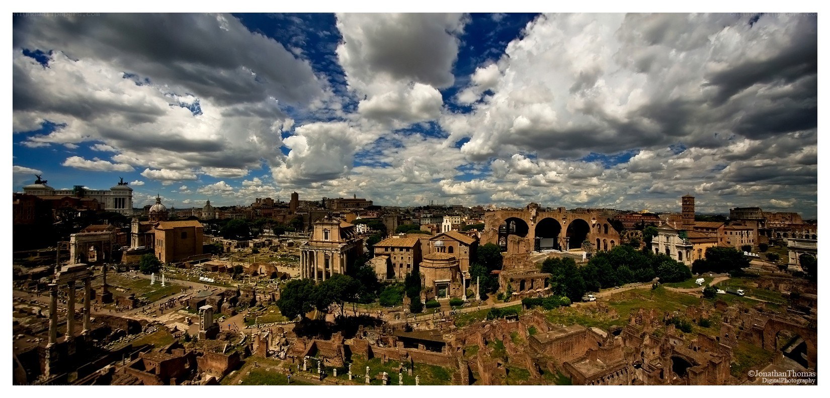 Roman Forum ruins under cloudy sky