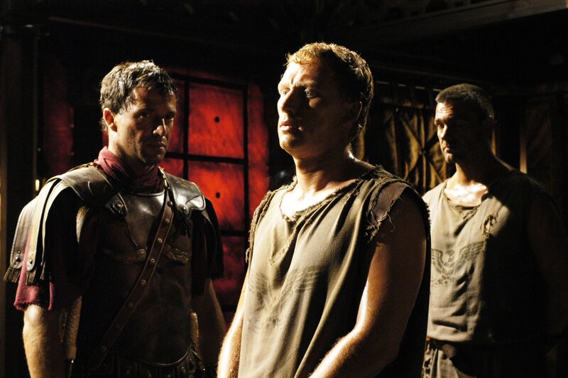 Roman soldiers in a dimly lit room
