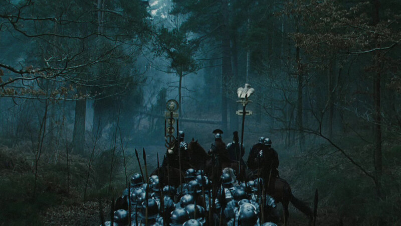 Roman soldiers in a misty forest