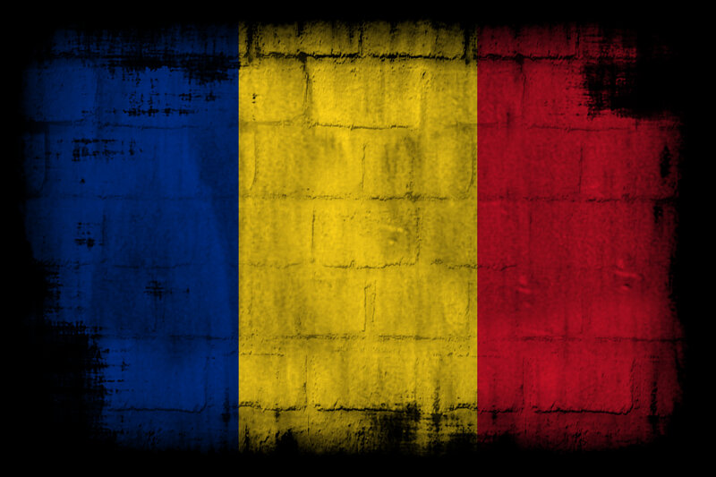 Romanian flag on brick wall