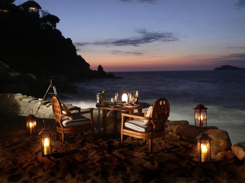 Romantic beach dinner at dusk