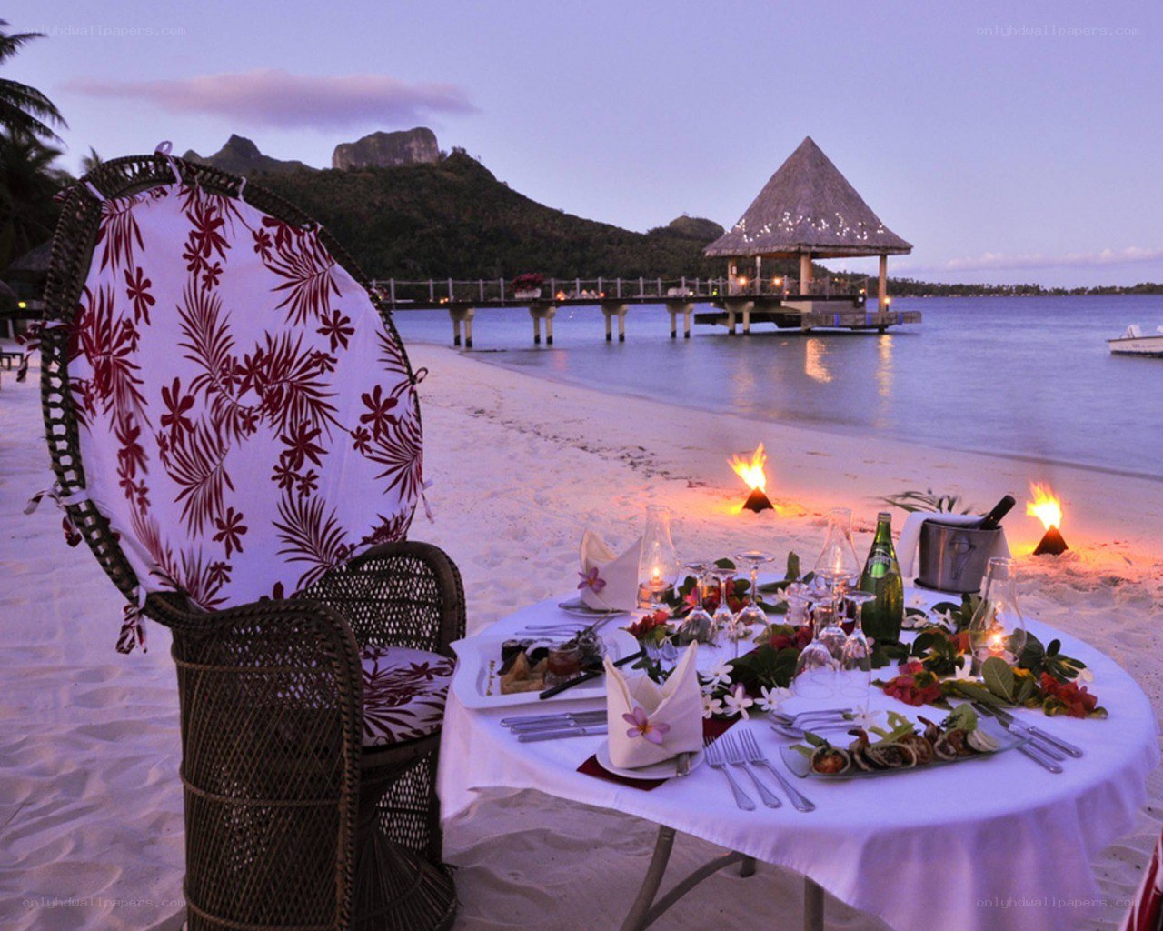Romantic beach dinner at dusk
