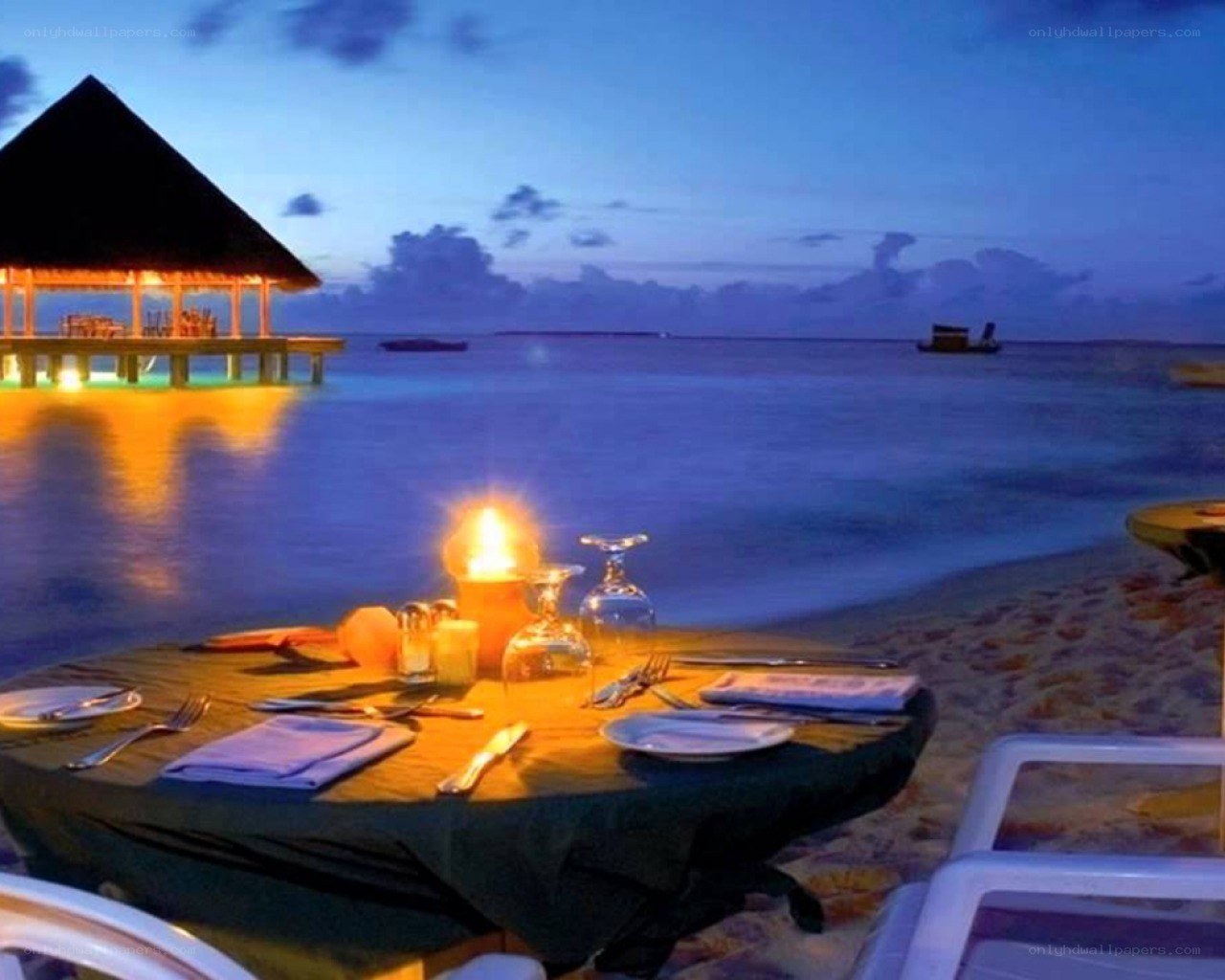 Romantic beach dinner at dusk