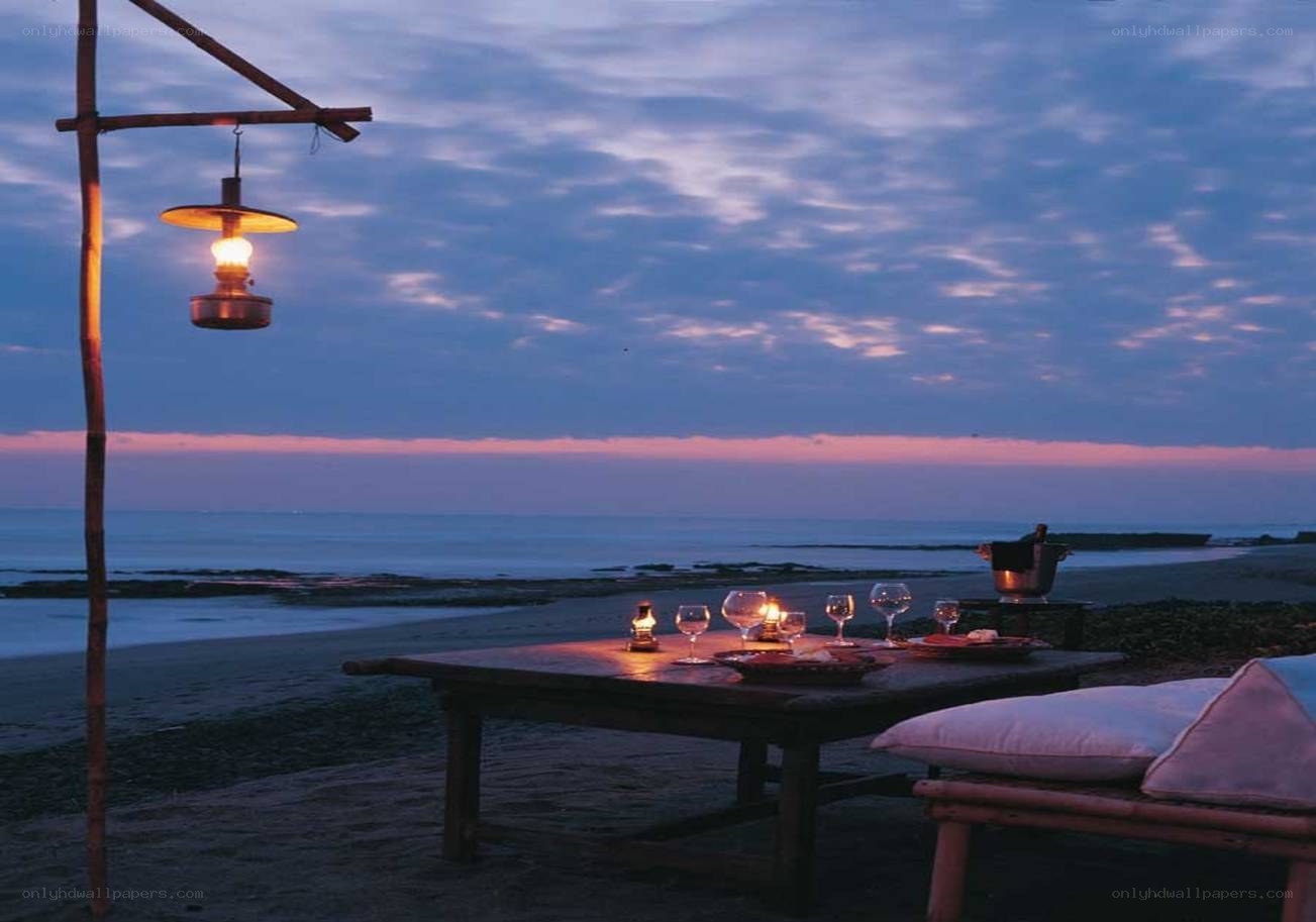 Romantic beach dinner at dusk