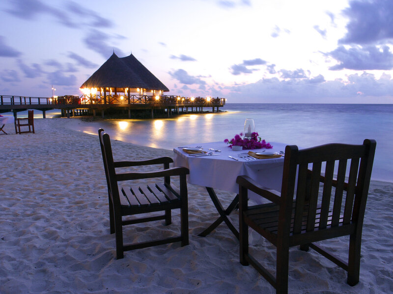 Romantic beach dinner at dusk