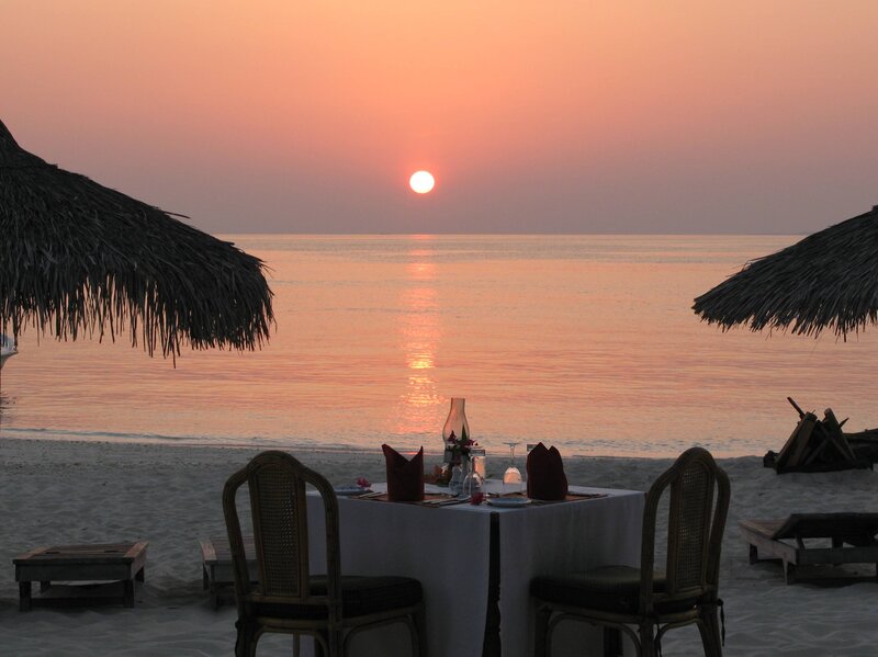 Romantic Beach Dinner — Orange, Serene