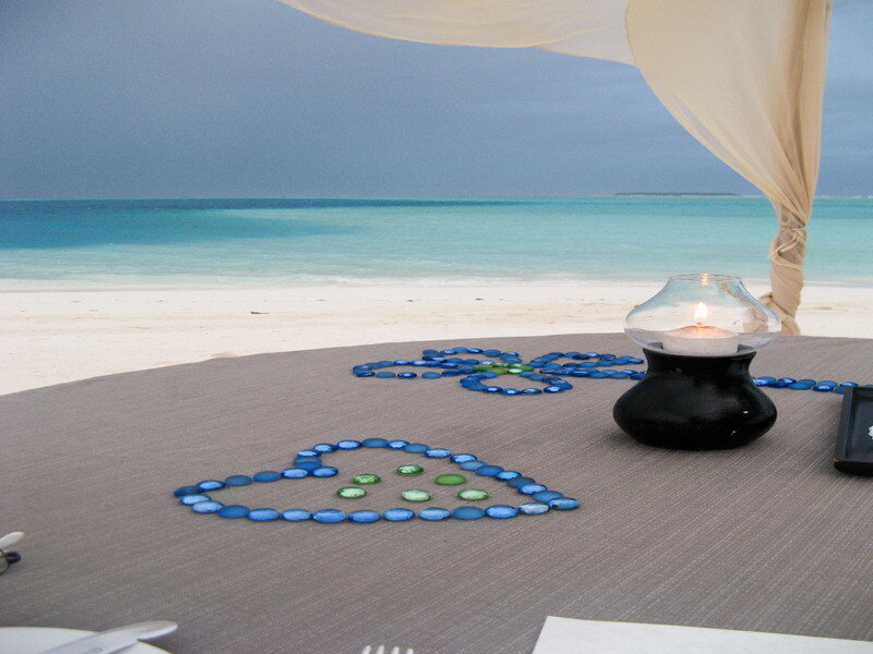 Romantic beach dinner setup