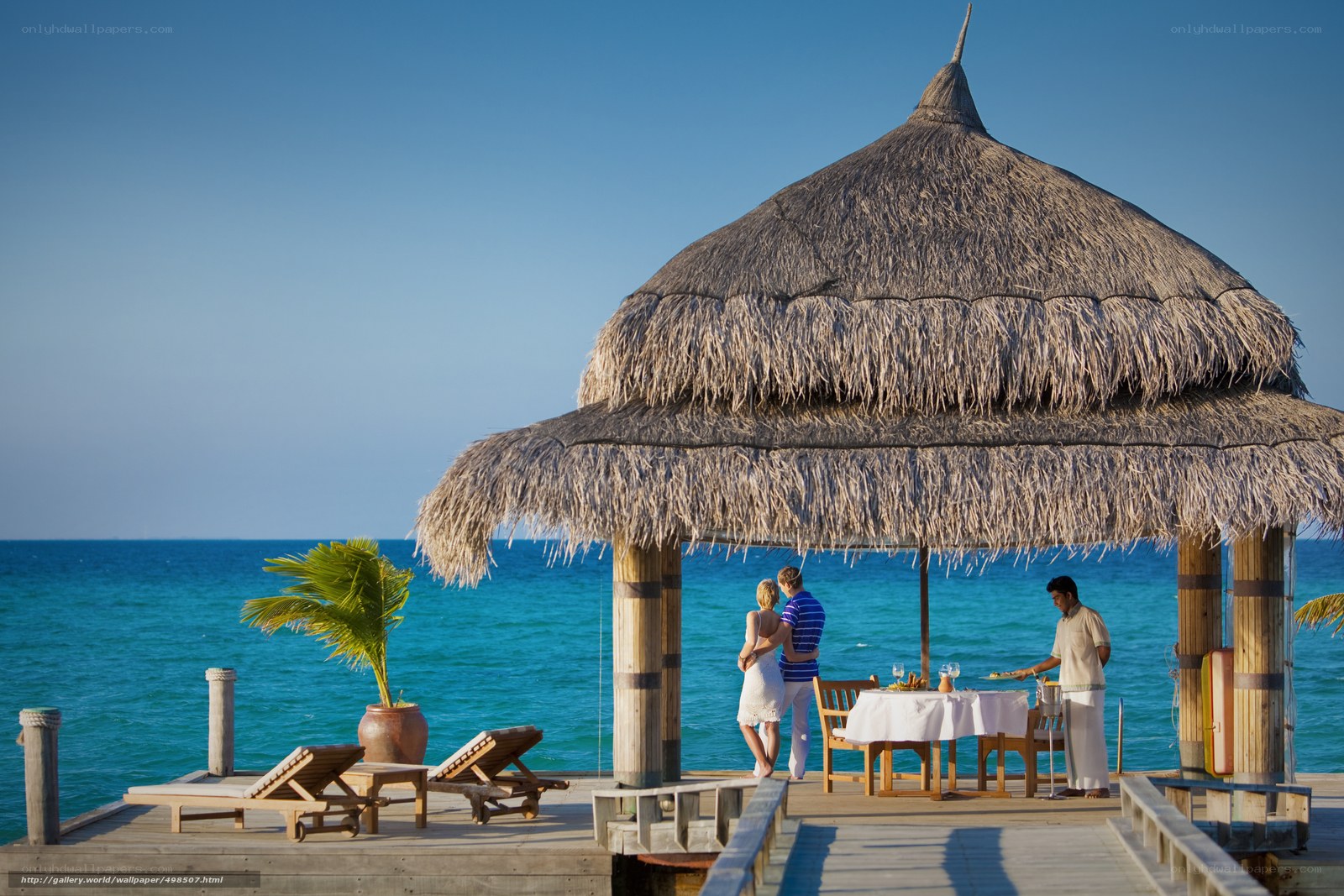 Romantic dinner on a beach pavilion