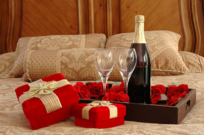 Romantic gift setup on bed