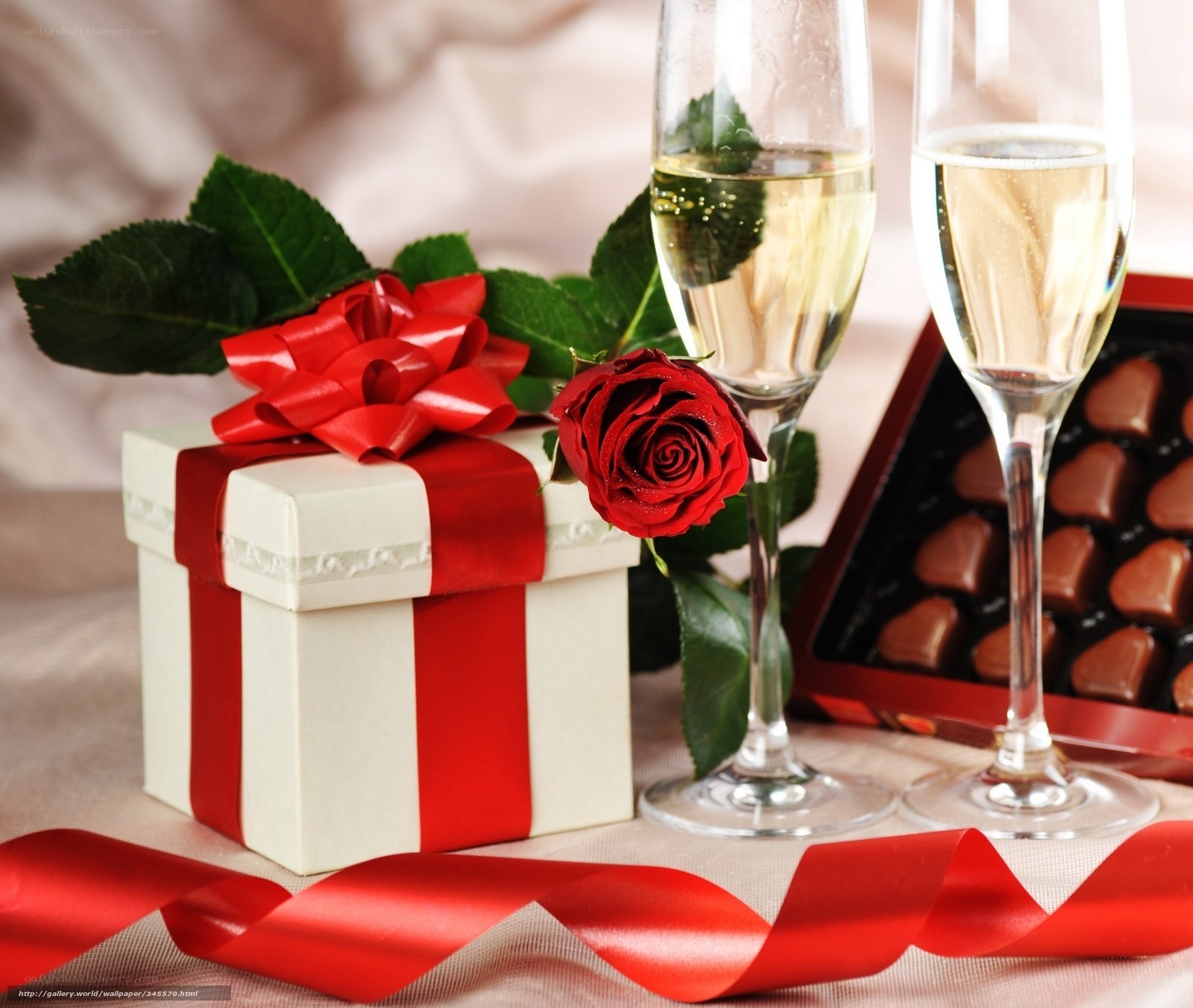 Romantic gift with roses and champagne