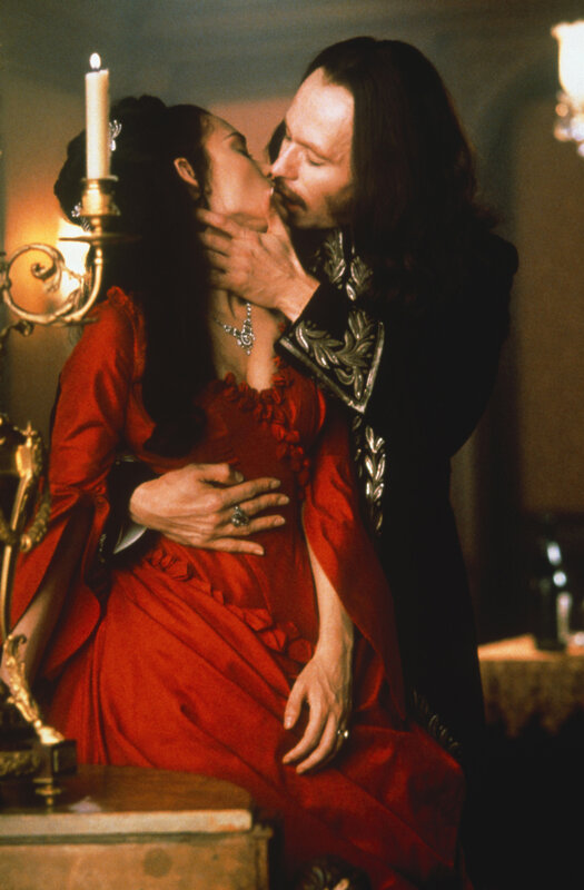 romantic kiss in red dress