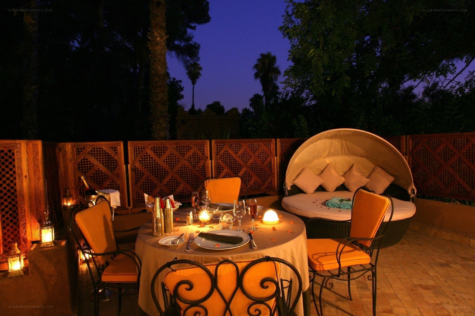 Romantic outdoor dinner at dusk