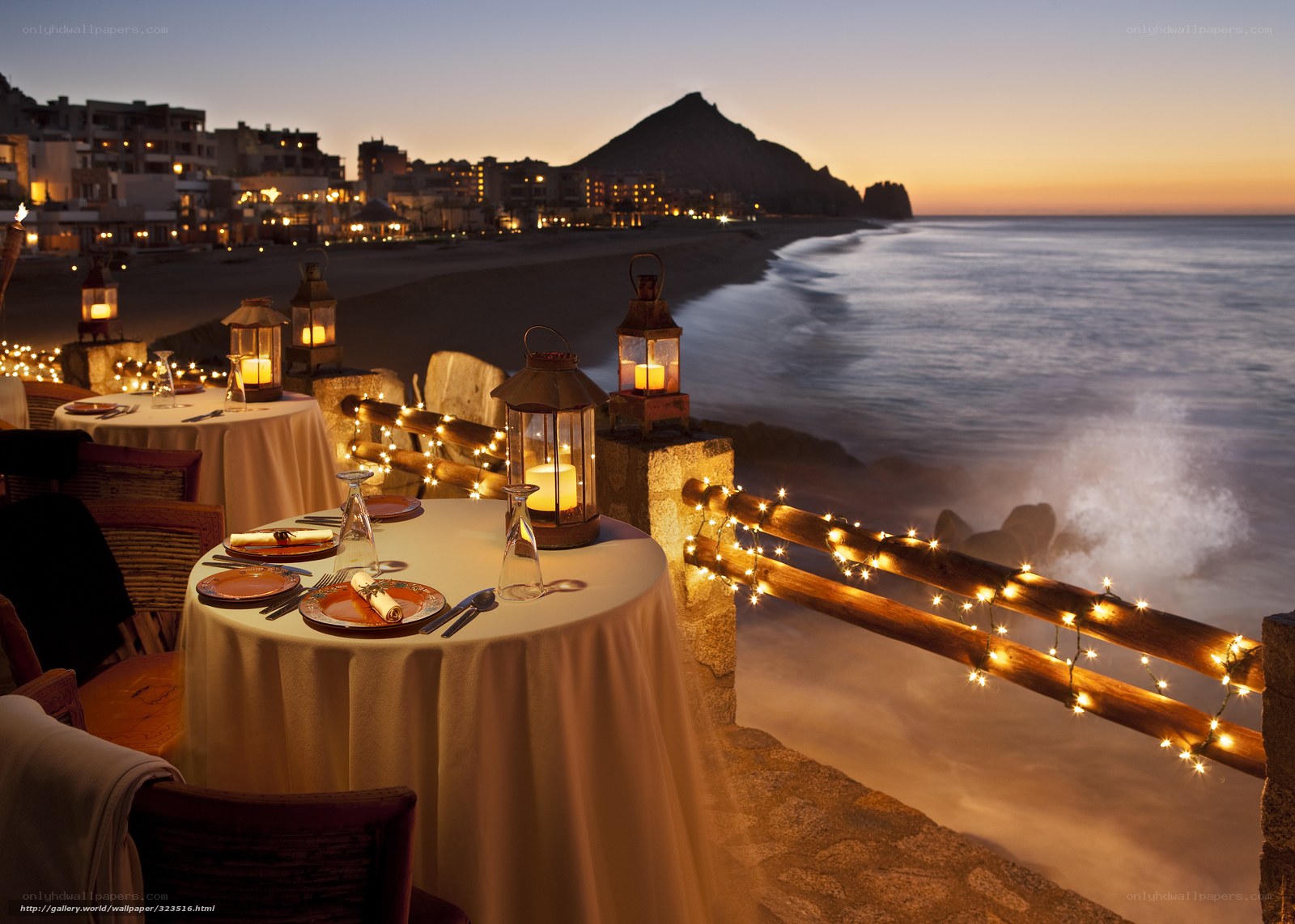 Romantic seaside dinner at dusk