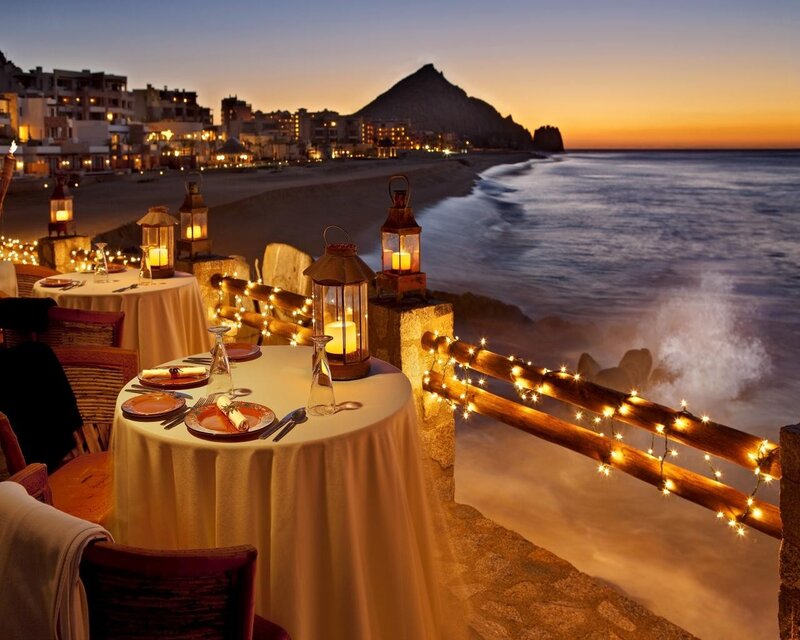 Romantic seaside dinner at sunset