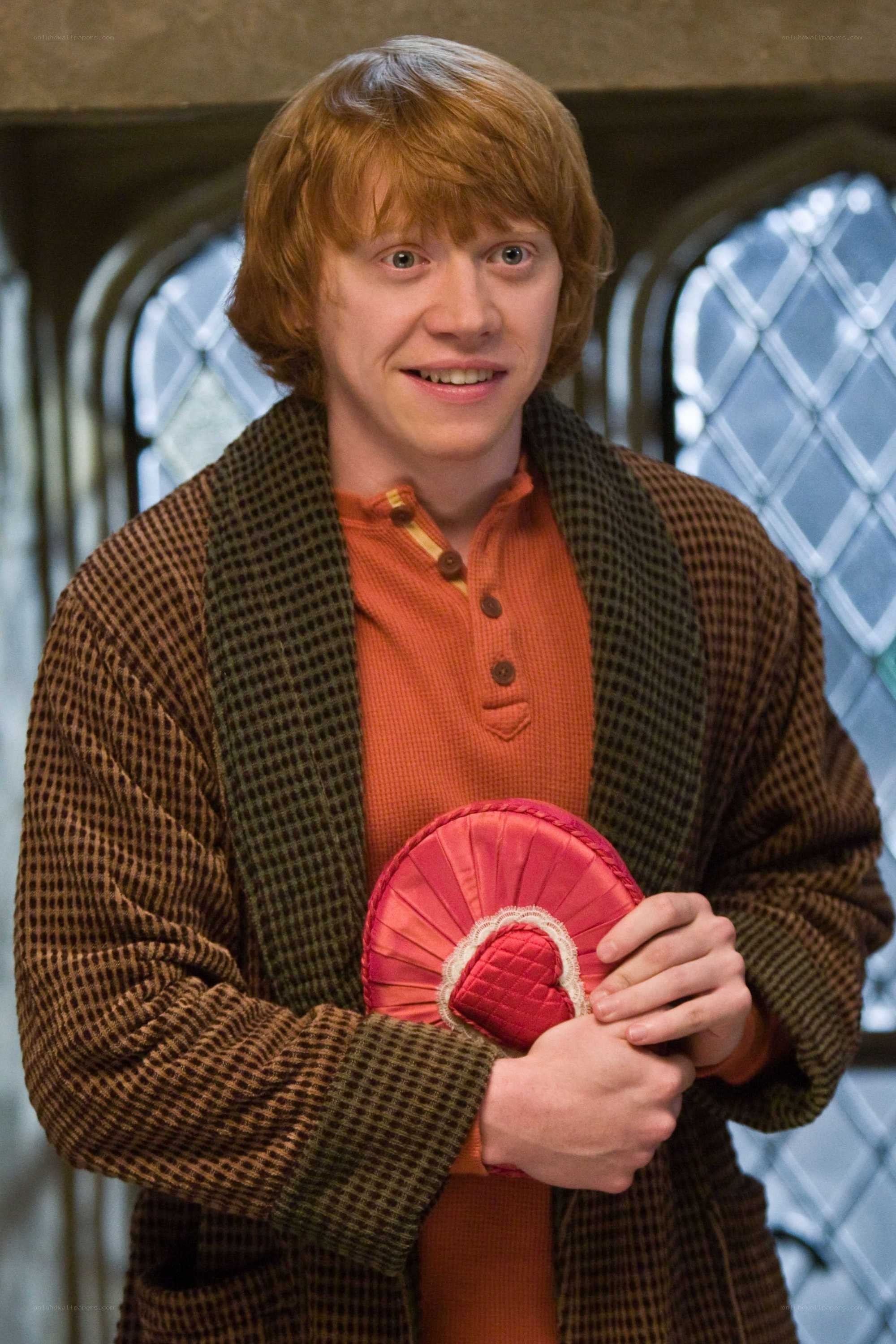 Ron Weasley holding a heart