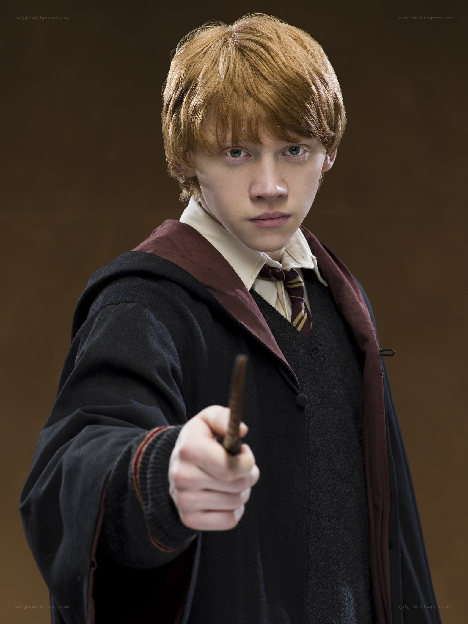 Ron Weasley holding wand