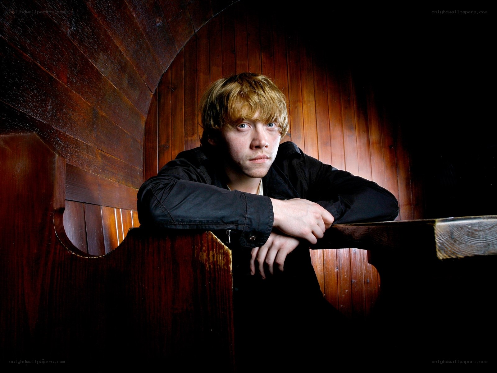 Ron Weasley in a wooden booth