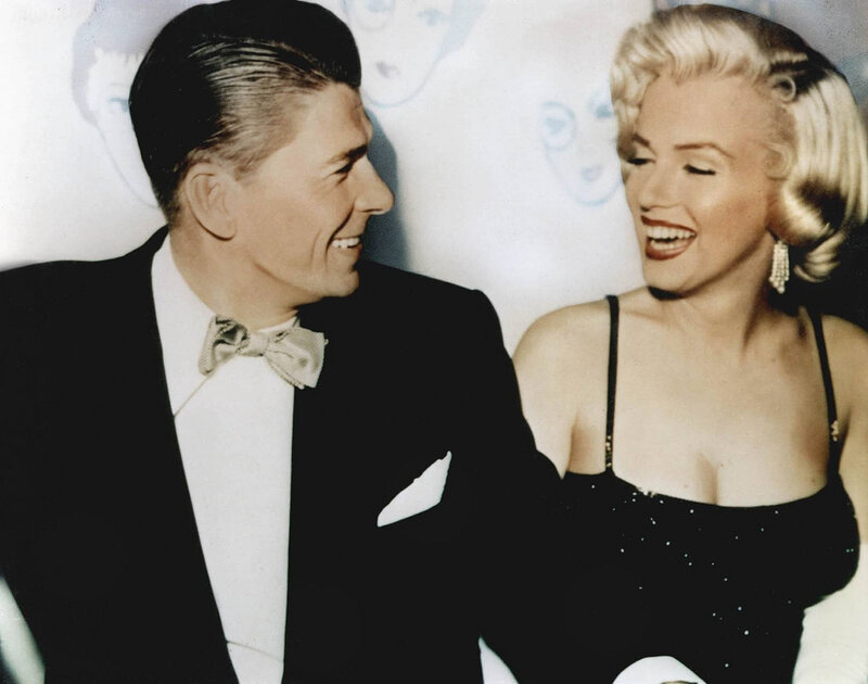 Ronald Reagan and Marilyn Monroe laughing