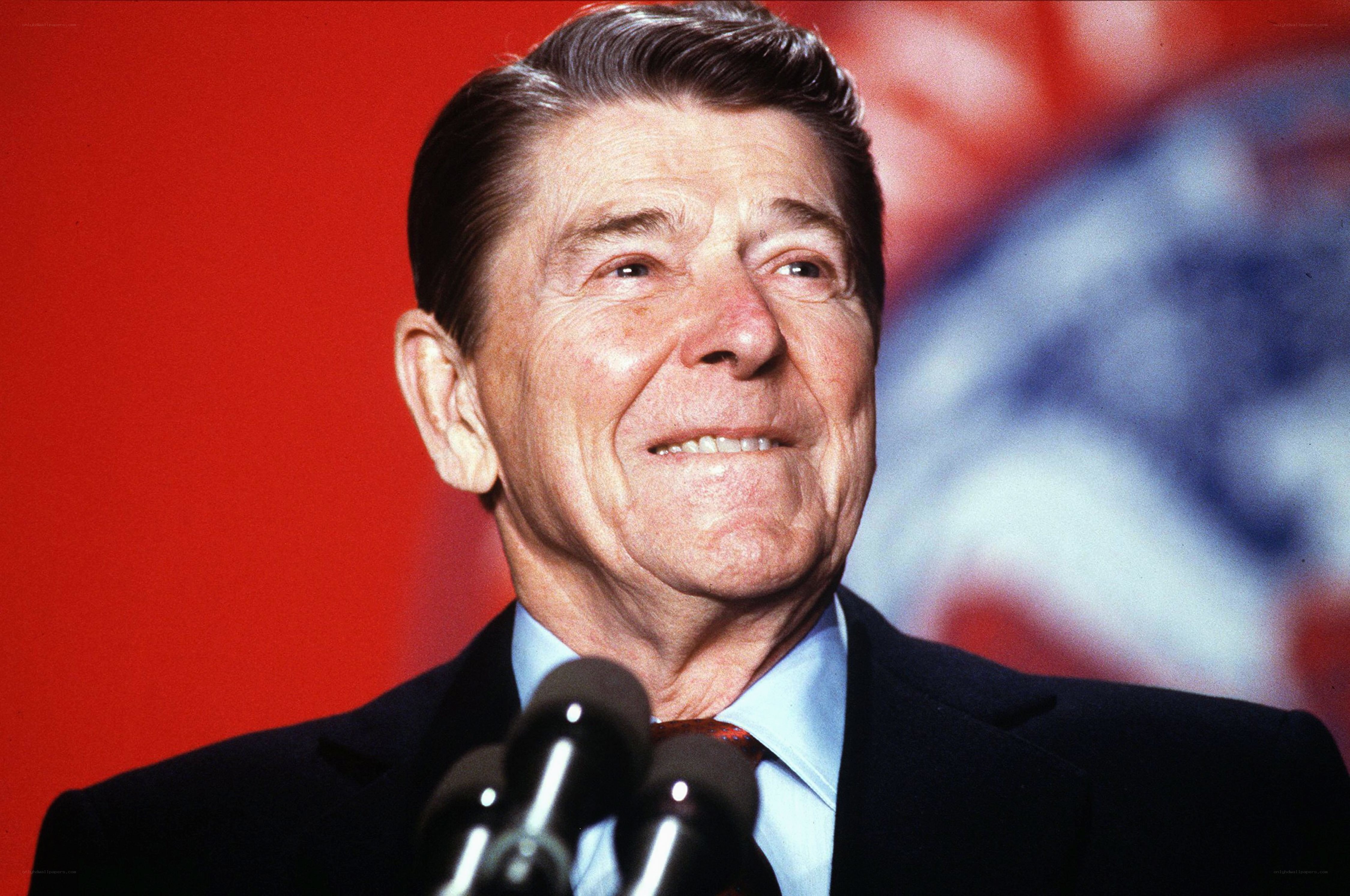 Ronald Reagan speaking at podium
