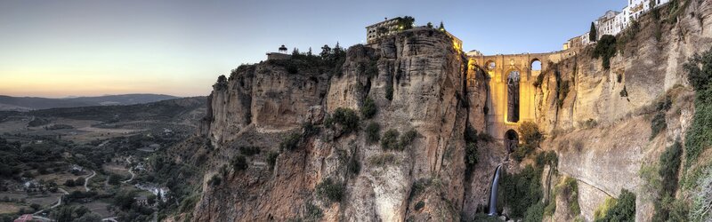 Ronda's historic bridge at dusk