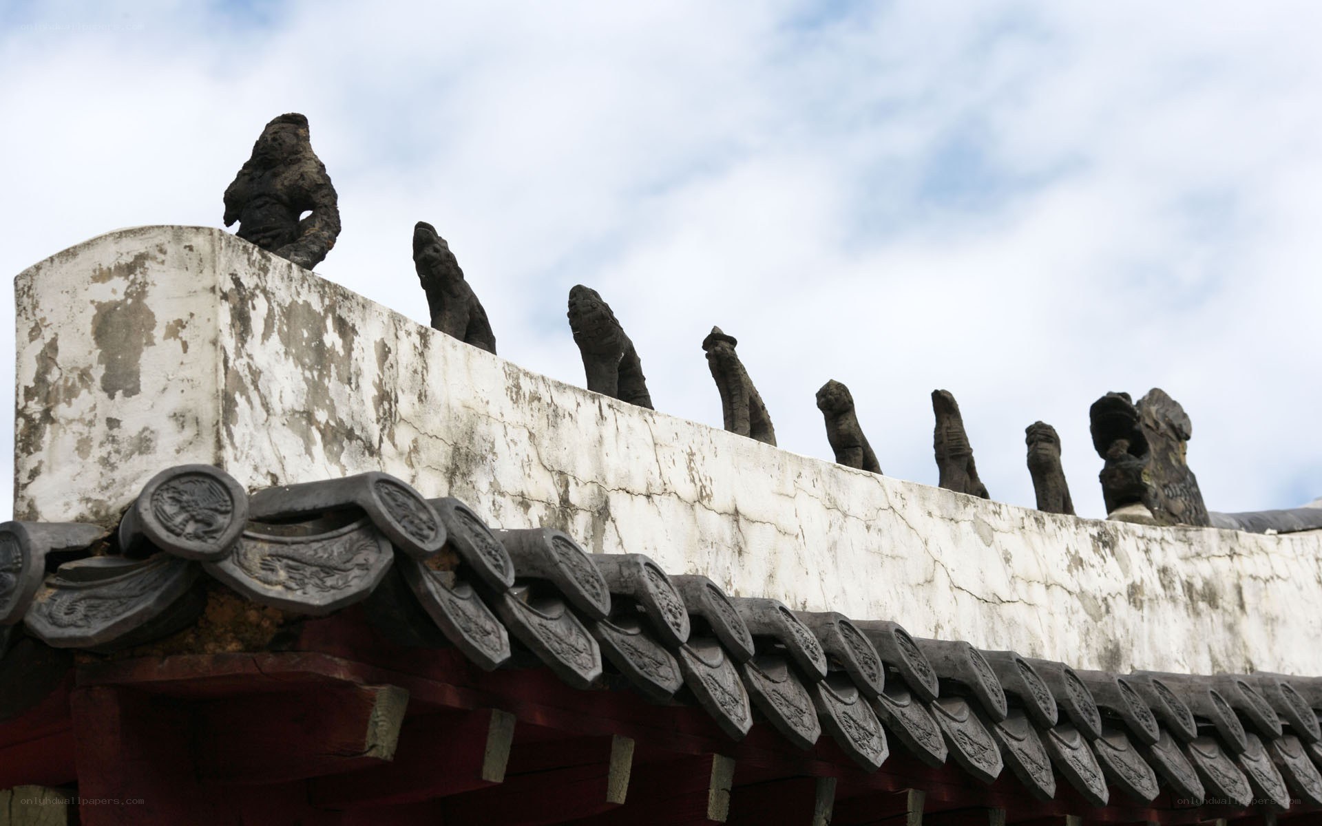 Roof tiles and figurines