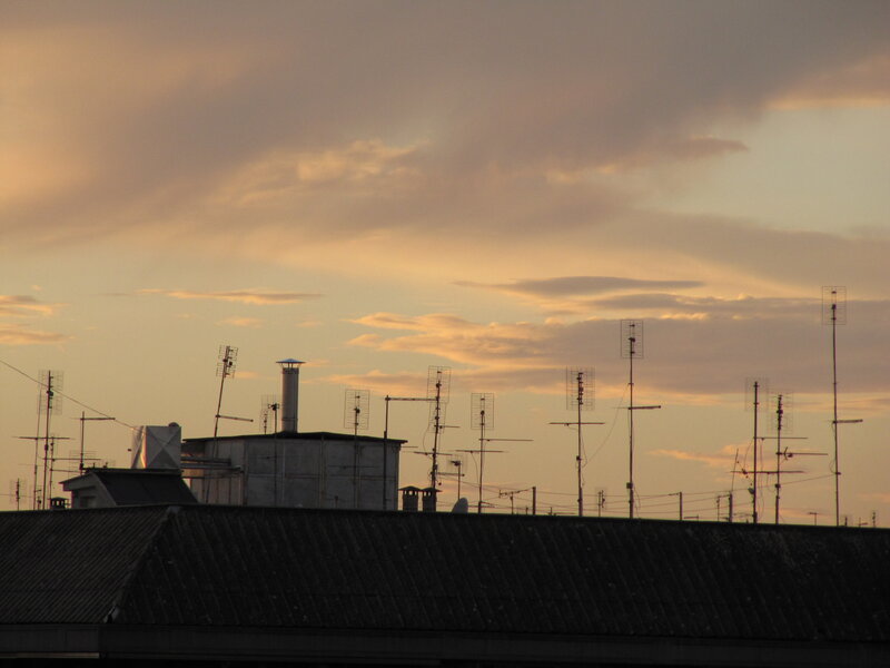 Rooftop Antennas at Dusk